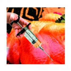 Jeringa grande con aguja gruesa: fotografía de stock