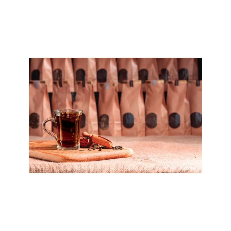 Taza 230ml Transparente Bock Arcoroc con té y granos de café frente a bolsas de té.